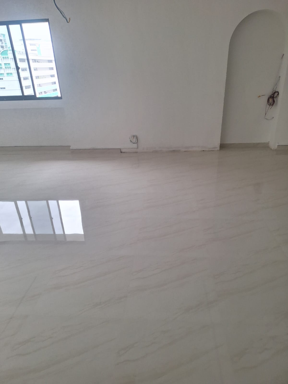 Close-up of glossy marble gum grout finish showing the marble-like veining